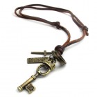 Кулон в виде ключа с королевской короной на кожаном коричневом шнурке